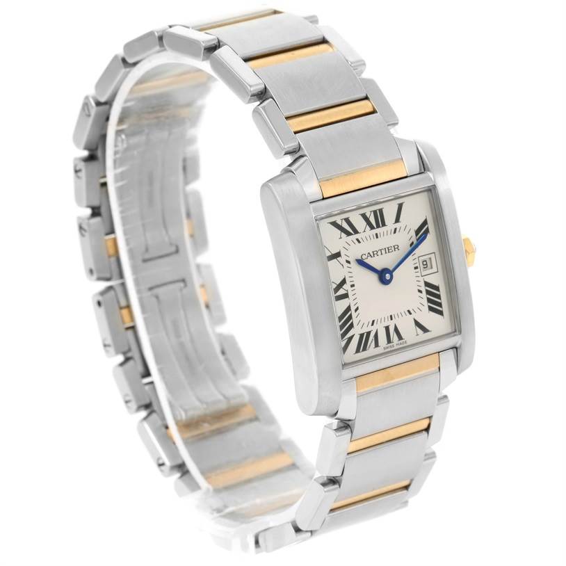 The Cartier Tank Francaise W51012Q4 Women's Steel and Gold (two tone) Silver Dial W51012Q4 Women's Steel and Gold (two tone) Silver Dial watch is shown in a three-quarter angle, displaying the bracelet, case, dial, and crown.
