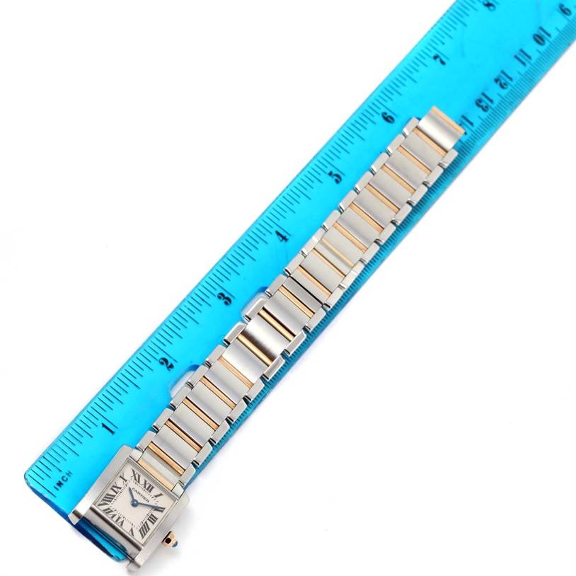 The Cartier Tank Francaise W51007Q4 Women's Steel and Gold (two tone) Silver Dial W51007Q4 Women's Steel and Gold (two tone) Silver Dial watch is shown at a top-down angle, including the face and full metal bracelet, measured alongside a ruler.