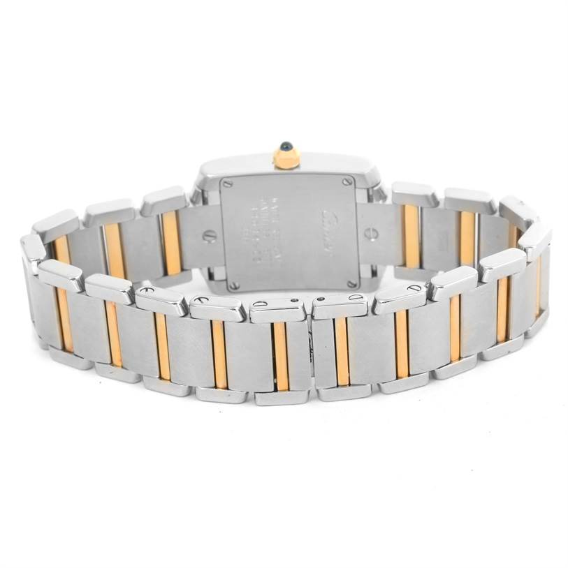 The image shows the back view of Cartier Tank Francaise W51007Q4 Women's Steel and Gold (two tone) Silver Dial W51007Q4 Women's Steel and Gold (two tone) Silver Dial's stainless steel and gold bracelet, alongside its case back.