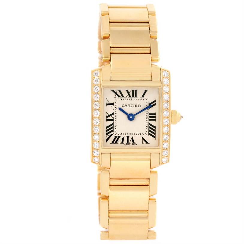 The image shows a Cartier Tank Francaise WE1001R8 Women's Yellow Gold Silver Dial WE1001R8 Women's Yellow Gold Silver Dial watch from a top-down angle, highlighting the face, bezel, and bracelet.