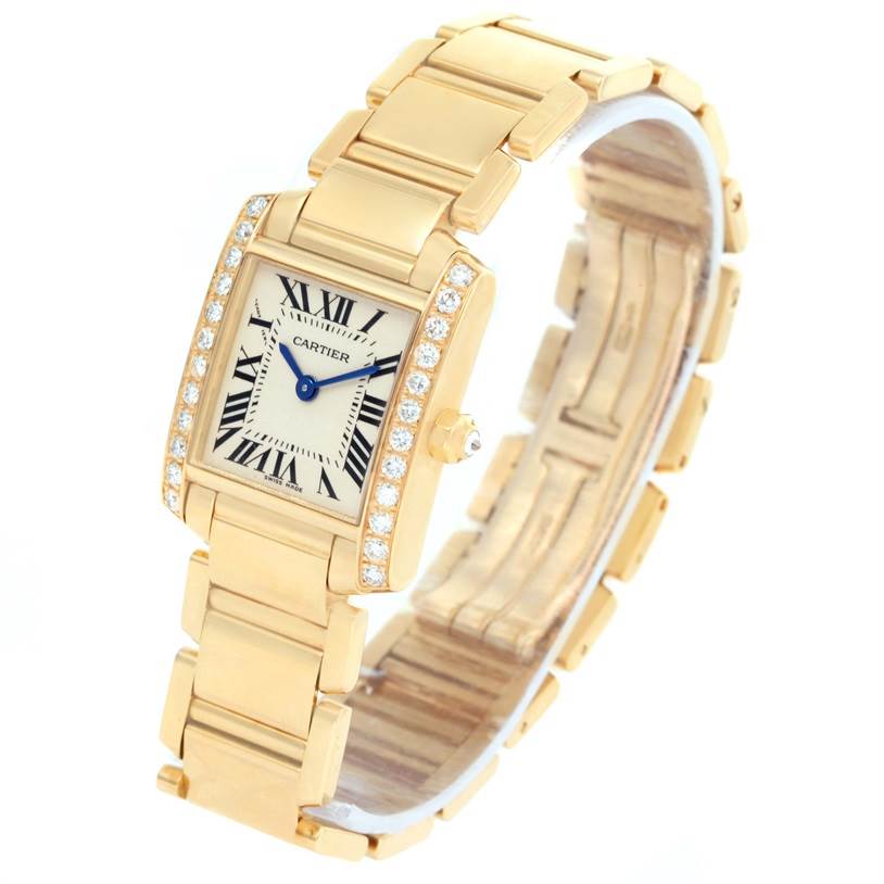The image shows the Cartier Tank Française watch at a slight angle, highlighting the face, bracelet, and diamond accents.