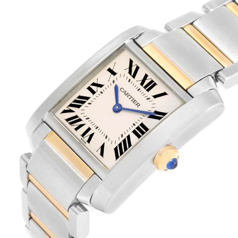 The image shows a close-up of the Cartier Tank Francaise W2TA0003 Women's Steel and Gold (two tone) Silver Dial W2TA0003 Women's Steel and Gold (two tone) Silver Dial watch face, crown, and part of the bracelet.