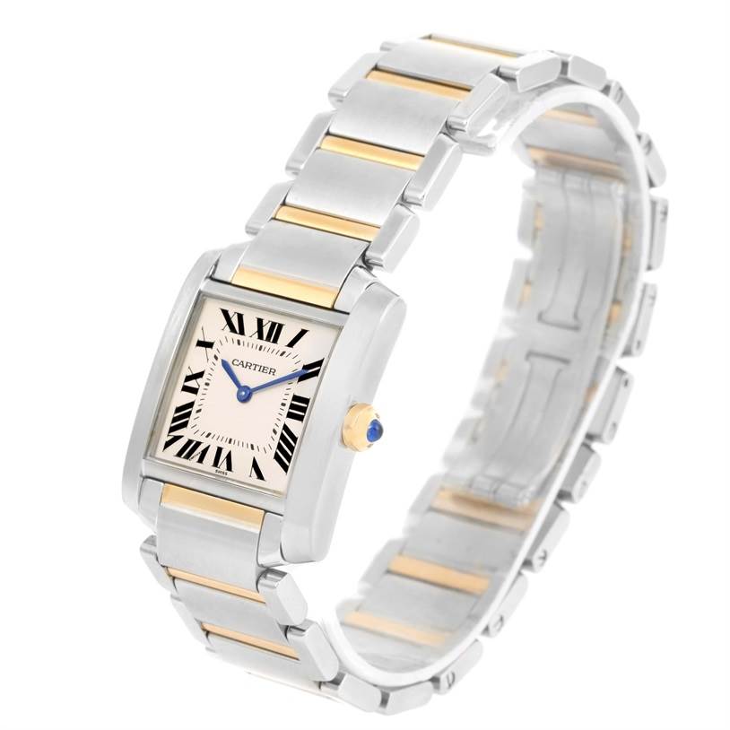 The Cartier Tank Française watch is shown at an angled side view, displaying its bracelet, dial, and crown.