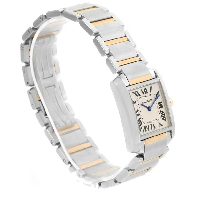 The image shows a Cartier Tank Francaise W2TA0003 Women's Steel and Gold (two tone) Silver Dial W2TA0003 Women's Steel and Gold (two tone) Silver Dial watch from an angled side view, displaying the rectangular face and metal bracelet with gold accents.