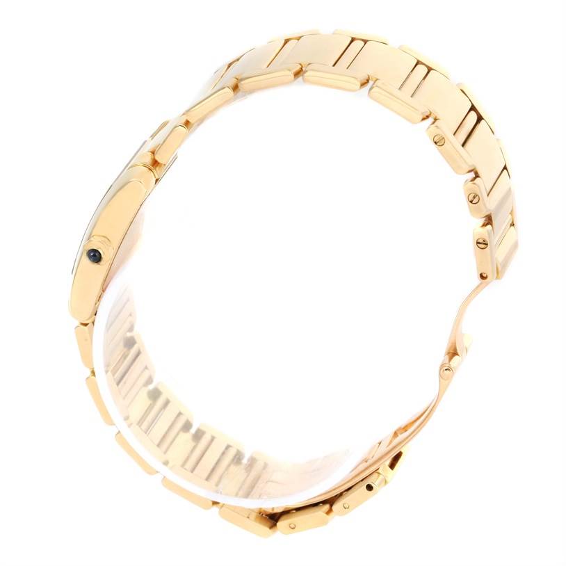 The image shows a side view of the Cartier Tank Française watch, focusing on the bracelet and case.