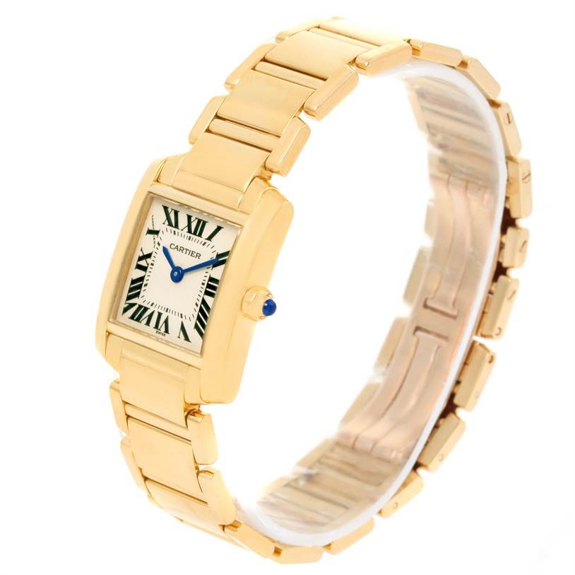 The image shows a Cartier Tank Francaise W50002N2 Women's Yellow Gold Silver Dial W50002N2 Women's Yellow Gold Silver Dial watch at a three-quarter angle, highlighting its gold bracelet, case, and Roman numeral dial.