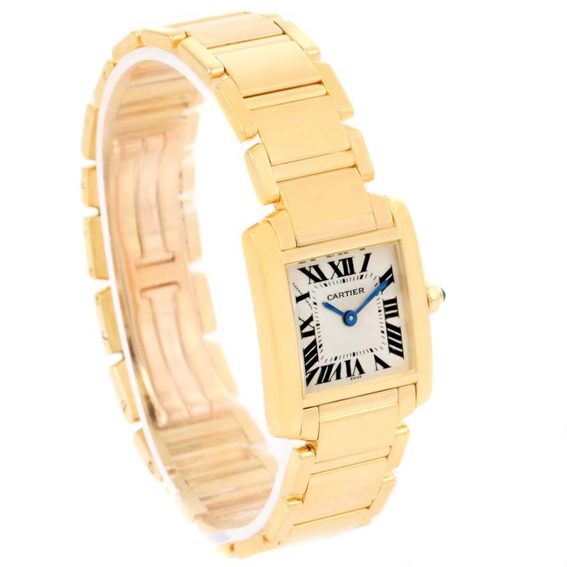 The image shows a Cartier Tank Francaise W50002N2 Women's Yellow Gold Silver Dial W50002N2 Women's Yellow Gold Silver Dial watch at a three-quarter angle, highlighting its gold bracelet, square face, and Roman numerals.