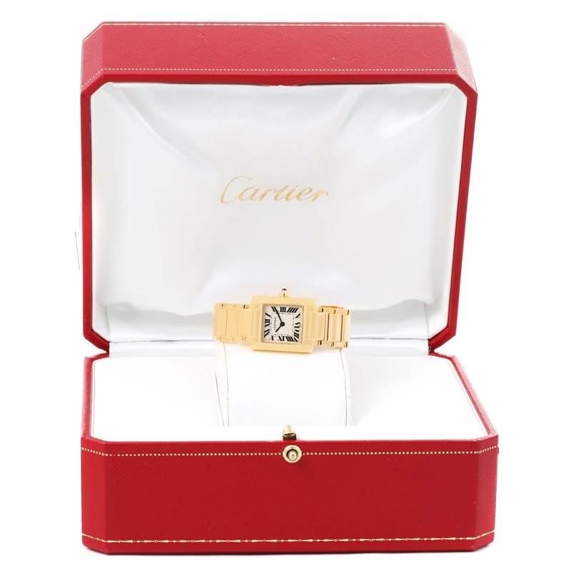 The Cartier Tank Francaise W50002N2 Women's Yellow Gold Silver Dial W50002N2 Women's Yellow Gold Silver Dial watch is shown front-facing inside its red and white presentation box.