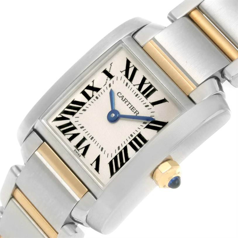 The Cartier Tank Francaise W51007Q4 Women's Steel and Gold (two tone) Silver Dial W51007Q4 Women's Steel and Gold (two tone) Silver Dial watch is shown at an angle displaying the square face, Roman numeral dial, and part of the metal and gold bracelet.