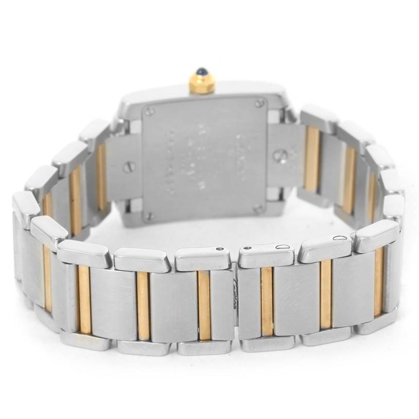 The image shows the backside of the Cartier Tank Francaise W51007Q4 Women's Steel and Gold (two tone) Silver Dial W51007Q4 Women's Steel and Gold (two tone) Silver Dial watch, highlighting its stainless steel and gold bracelet.