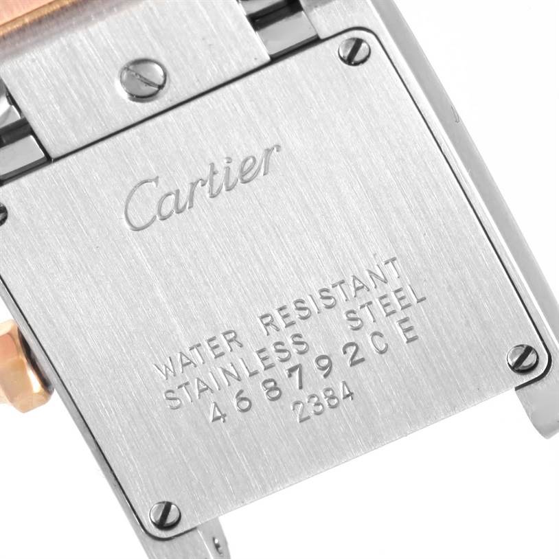 The image shows the back case of a Cartier Tank Francaise W51027Q4 Women's Steel and Gold (two tone) Mother of Pearl Dial W51027Q4 Women's Steel and Gold (two tone) Mother of Pearl Dial watch, displaying the brand name, water resistance information, and serial number.