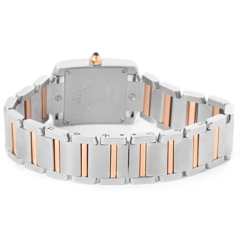 This image shows the back and bracelet of a Cartier Tank Francaise W51027Q4 Women's Steel and Gold (two tone) Mother of Pearl Dial W51027Q4 Women's Steel and Gold (two tone) Mother of Pearl Dial watch, featuring a two-tone metal design.