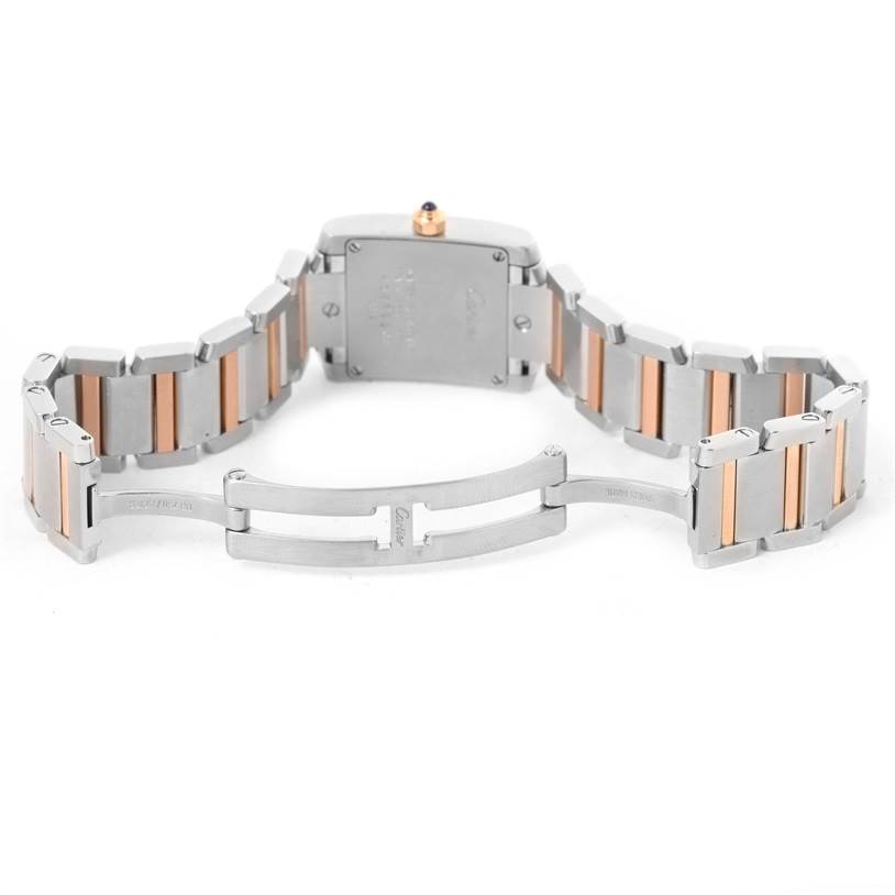 The image shows the underside and clasp of the Cartier Tank Francaise W51027Q4 Women's Steel and Gold (two tone) Mother of Pearl Dial W51027Q4 Women's Steel and Gold (two tone) Mother of Pearl Dial watch, highlighting the bracelet and the back of the case.