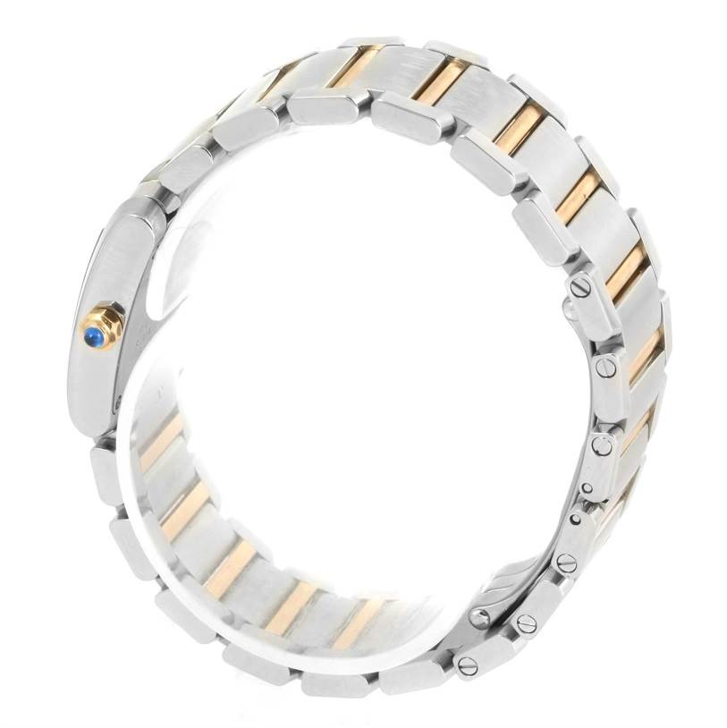 The image shows the bracelet and side view of a Tank Française model by Cartier, highlighting its two-tone metal links and crown.