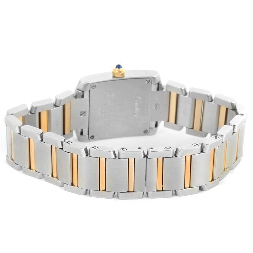 This image shows the back of a Cartier Tank Francaise W51007Q4 Women's Steel and Gold (two tone) Silver Dial W51007Q4 Women's Steel and Gold (two tone) Silver Dial watch, highlighting its two-tone metal bracelet and caseback.