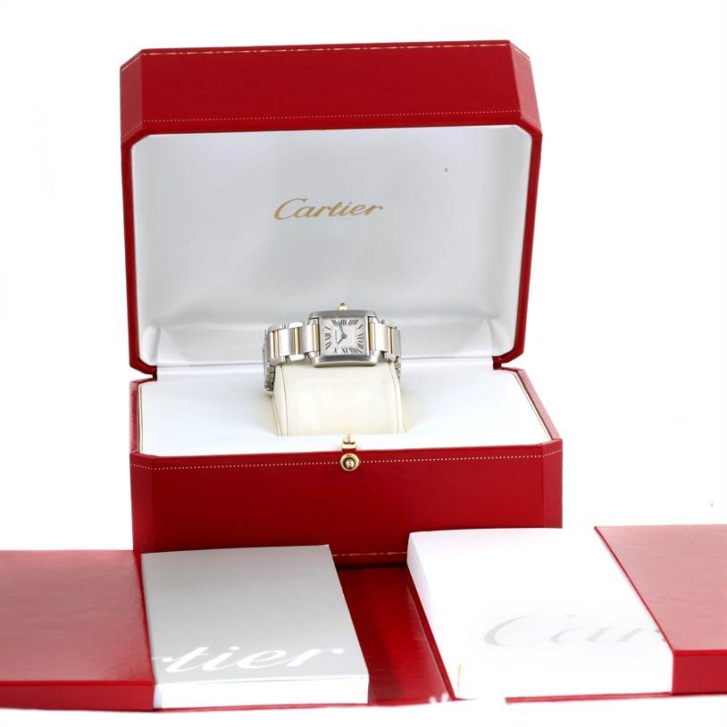 A Cartier Tank Francaise W51007Q4 Women's Steel and Gold (two tone) Silver Dial W51007Q4 Women's Steel and Gold (two tone) Silver Dial watch in a red presentation box with brand booklets shown.