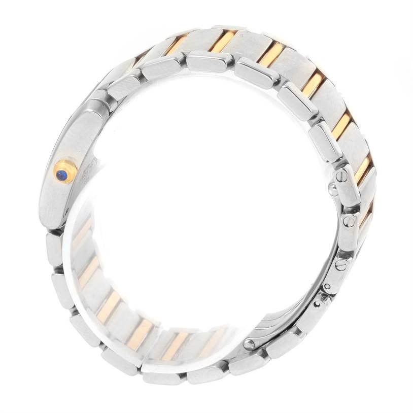 The image shows the bracelet and part of the side case of a Cartier Tank Française watch, viewed from a side angle.