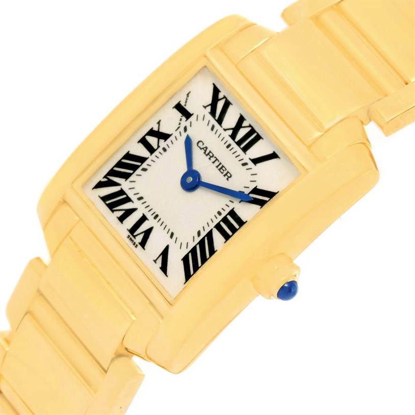 This image shows a Cartier Tank Française watch at an angled close-up, highlighting its dial, hands, and part of the bracelet.