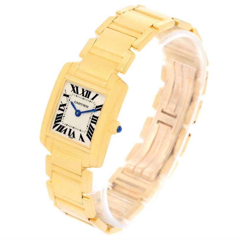 The image shows a Cartier Tank Française watch angled slightly from the front, highlighting the gold bracelet and square face with Roman numerals.