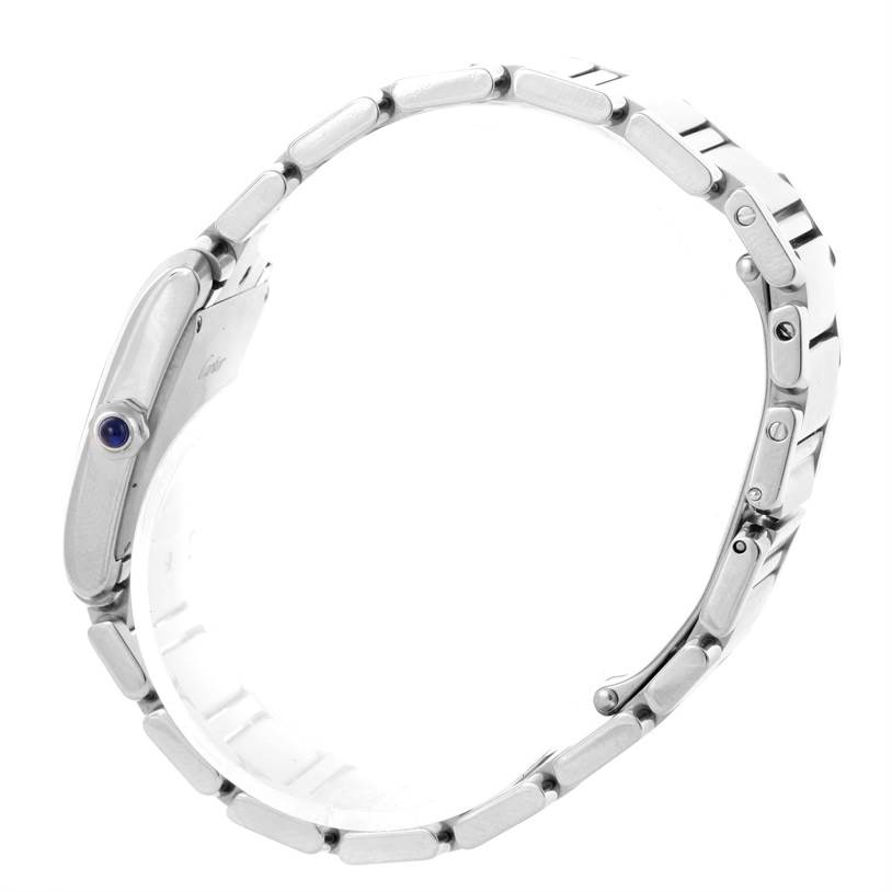 This image shows the side profile of a Cartier Tank Française watch, highlighting the bracelet and crown with a blue cabochon.