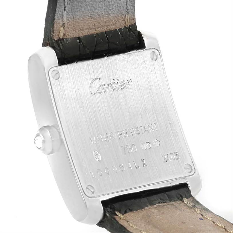 The image shows the back of a Cartier Tank Francaise WE100231 Women's White Gold Silver Dial WE100231 Women's White Gold Silver Dial watch, including the case back and part of the leather strap.