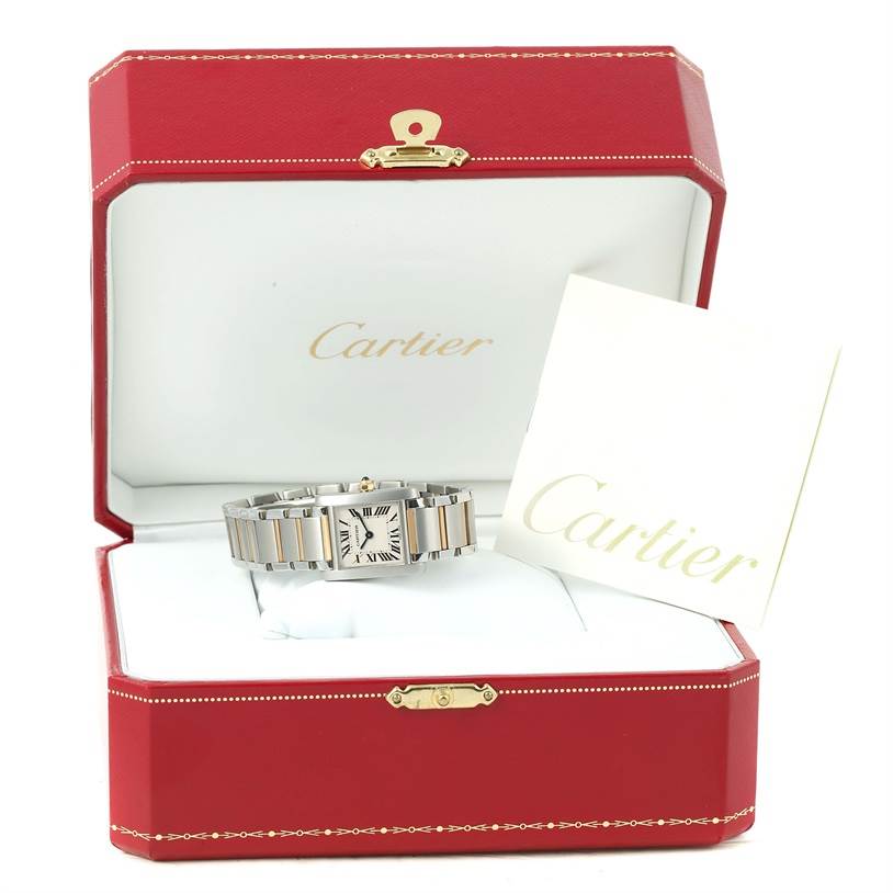 The Cartier Tank Francaise W51007Q4 Women's Steel and Gold (two tone) Silver Dial W51007Q4 Women's Steel and Gold (two tone) Silver Dial watch is shown in its open red box, with a visible booklet beside it.