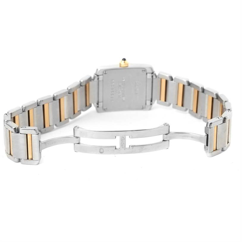 The image shows the back and open clasp of a Cartier Tank Francaise W51007Q4 Women's Steel and Gold (two tone) Silver Dial W51007Q4 Women's Steel and Gold (two tone) Silver Dial watch, highlighting its two-tone metal bracelet.