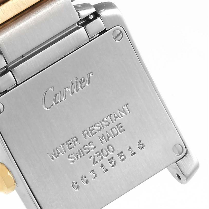 The image shows the back case of a Cartier Tank Francaise W51007Q4 Women's Steel and Gold (two tone) Silver Dial W51007Q4 Women's Steel and Gold (two tone) Silver Dial watch, displaying brand engraving and model information.