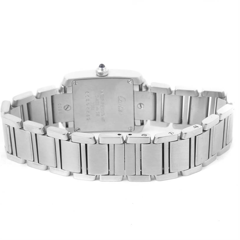 The image shows the back case and bracelet of a Cartier Tank Française watch in a rear view angle.