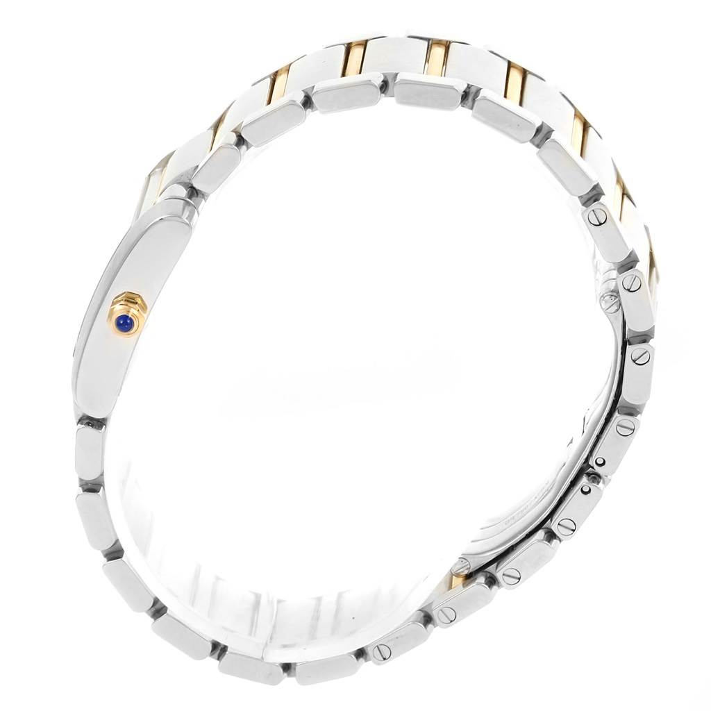 The Cartier Tank Française model watch is shown from a side angle, highlighting the bracelet and case details.