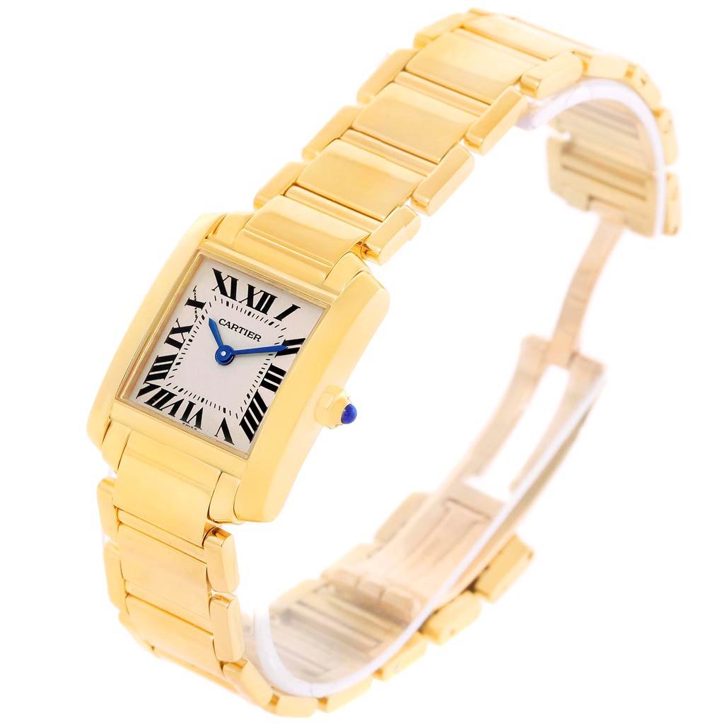 The photo shows a Cartier Tank Francaise W50002N2 Women's Yellow Gold Silver Dial W50002N2 Women's Yellow Gold Silver Dial watch at a three-quarter angle, highlighting its gold case, bracelet, and Roman numeral dial.