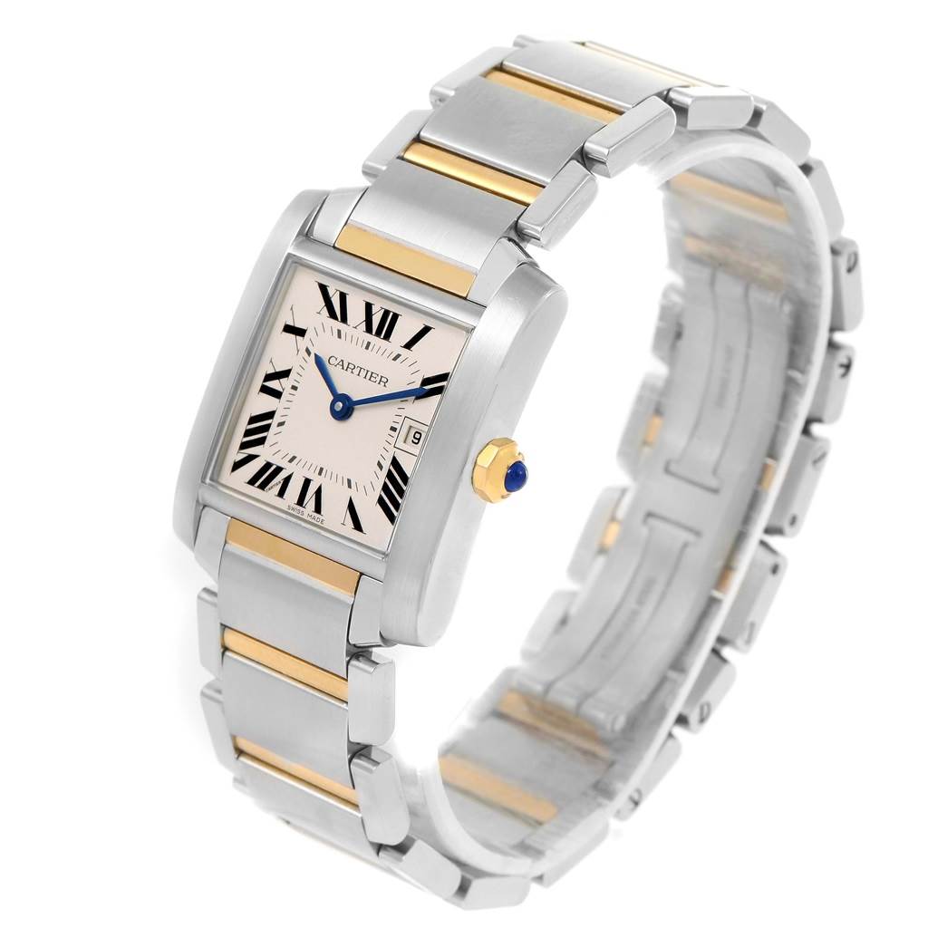 The Cartier Tank Francaise W51012Q4 Women's Steel and Gold (two tone) Silver Dial W51012Q4 Women's Steel and Gold (two tone) Silver Dial watch is shown at an angle displaying its face, bracelet, crown, and date function.