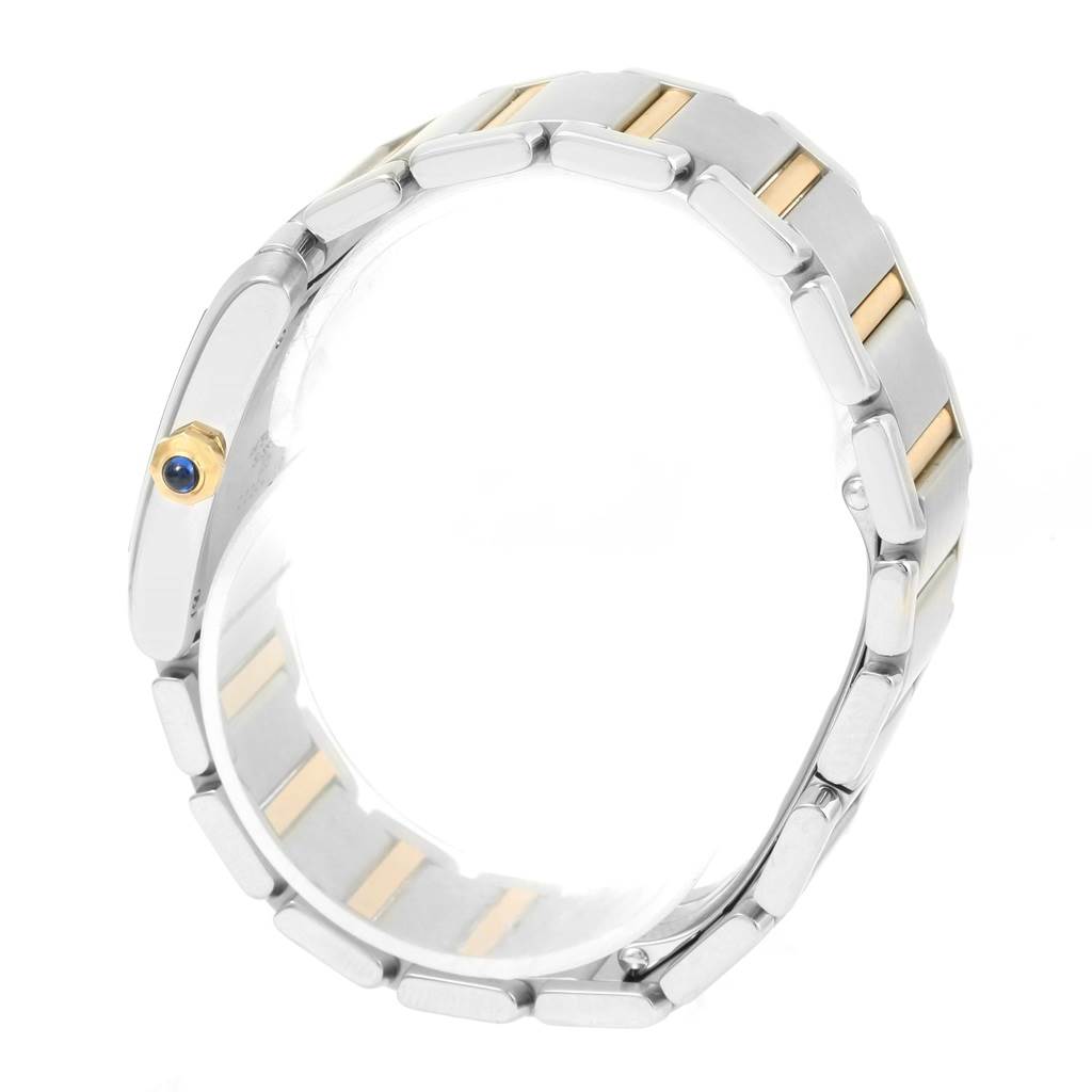 The image shows the bracelet and crown of a Cartier Tank Française, viewed from the side.