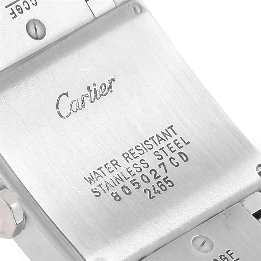 The image shows the back of a Cartier Tank Francaise W51011Q3 Women's Stainless Steel White Dial W51011Q3 Women's Stainless Steel White Dial watch with engraved details about water resistance and material.