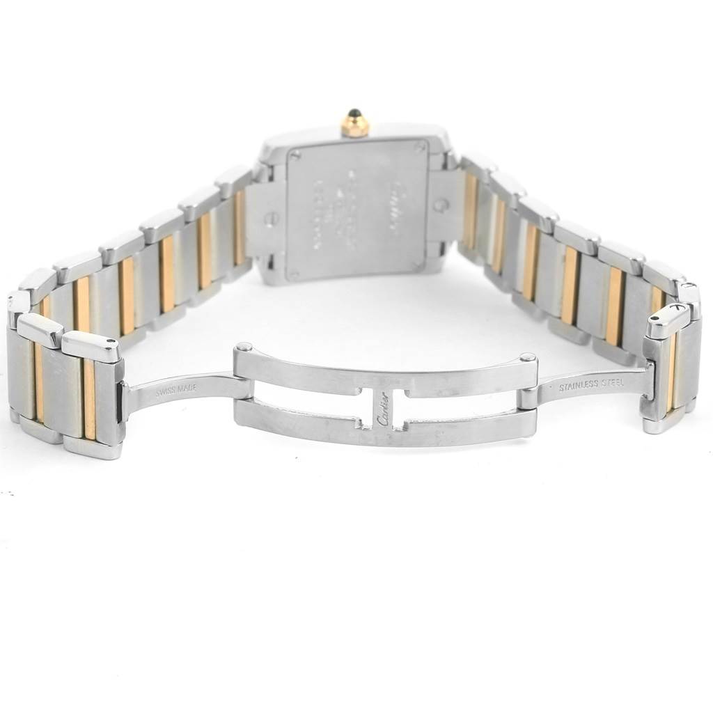 The image shows the back and clasp of a Tank Francaise watch by Cartier, displayed at a straight-on angle with the bracelet open.