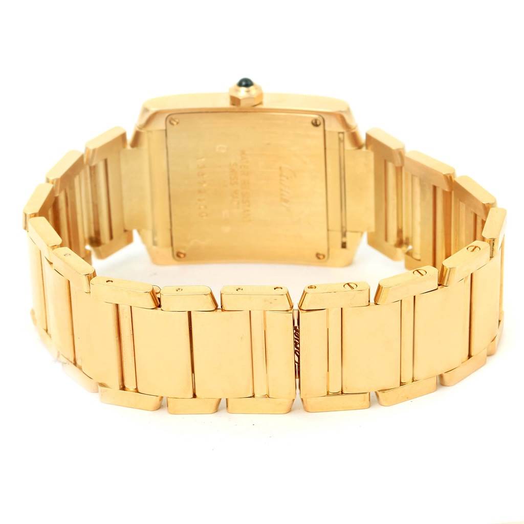 The image shows the back view and bracelet of a Cartier Tank Française watch.