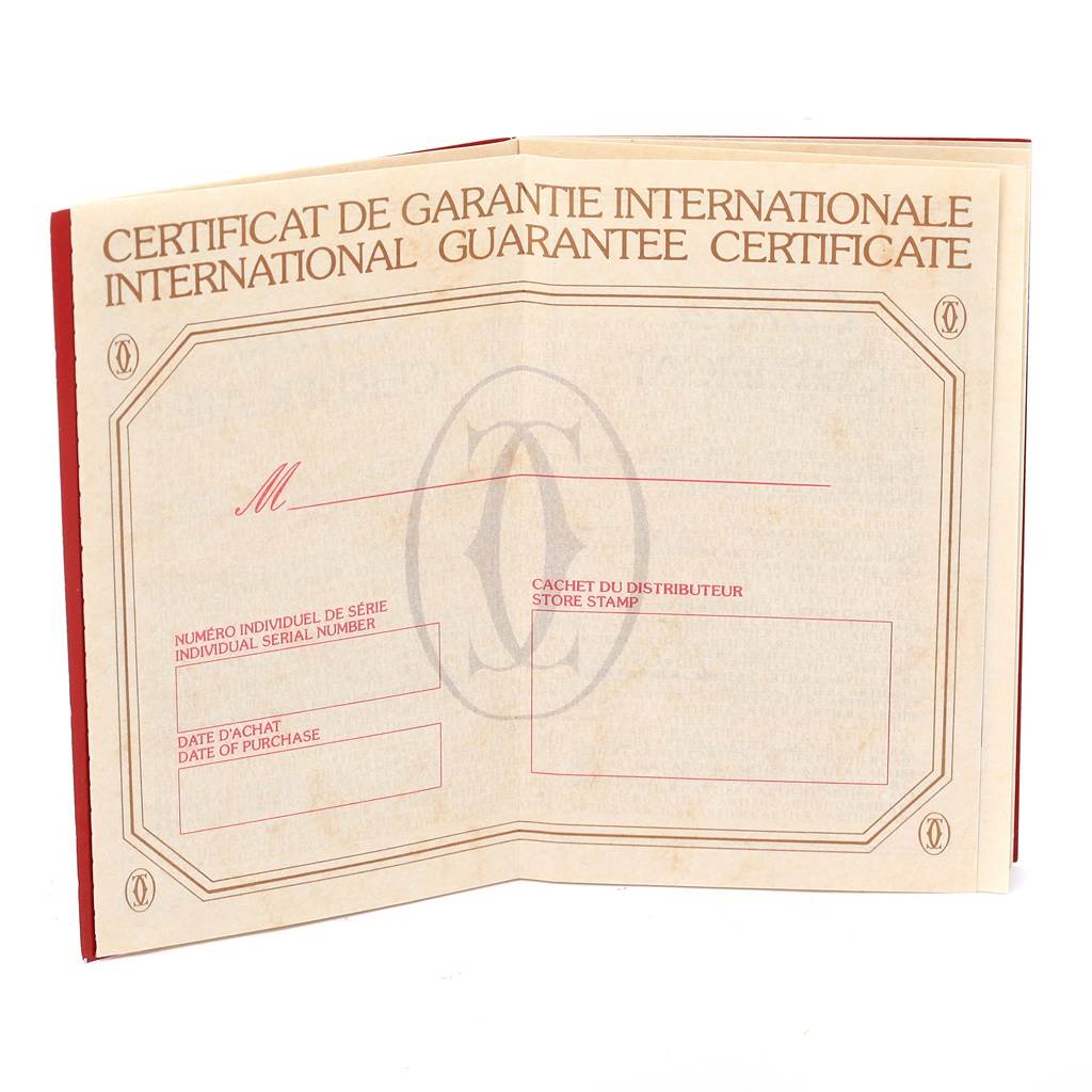 The image shows the open international guarantee certificate for the Cartier Tank Française watch model.