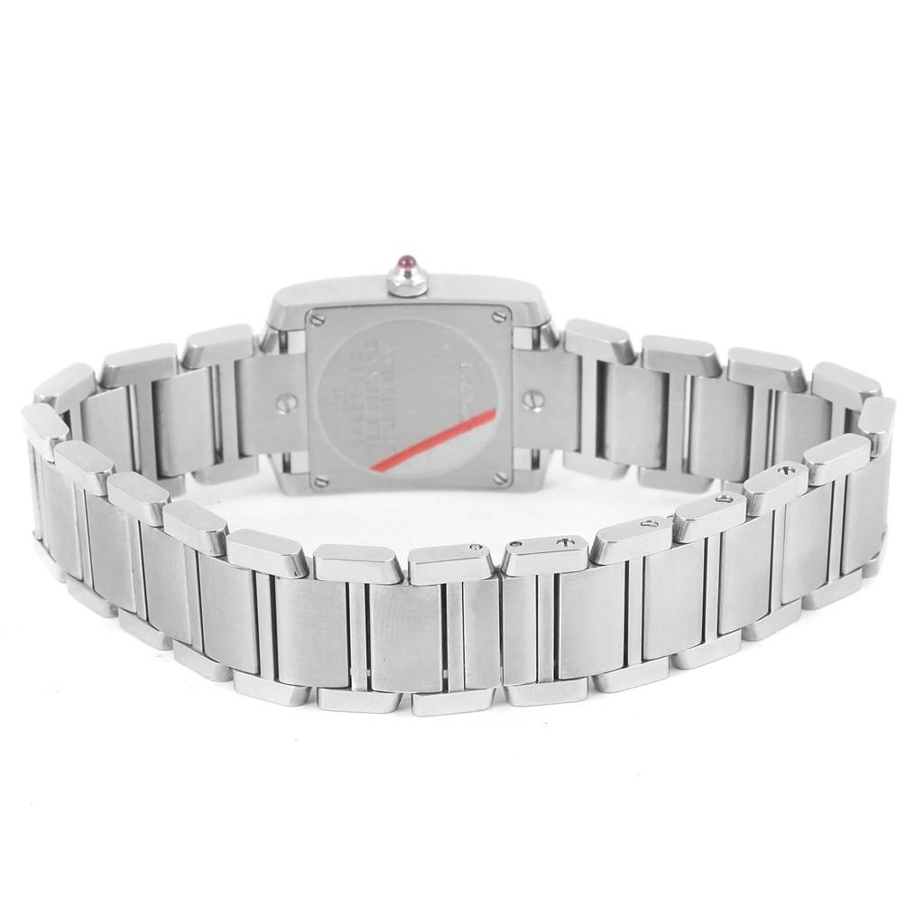 This image shows the back and bracelet of a Cartier Tank Française watch, highlighting the metal links and case back details.