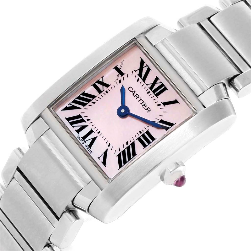 The image shows a Tank Francaise model by Cartier at an angled close-up, displaying the face, Roman numerals, blue hands, and part of the metal band.