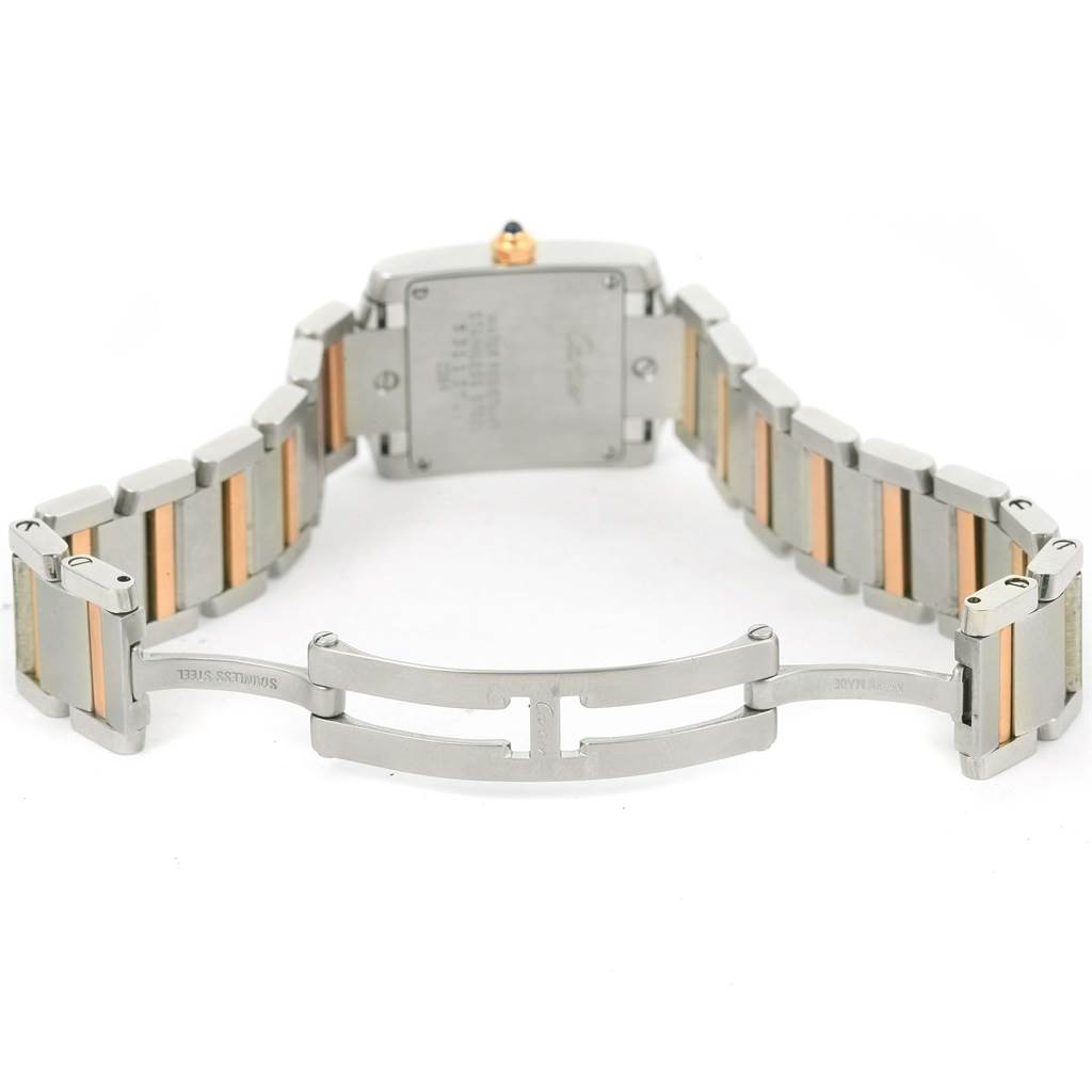 The image shows the back view of a Cartier Tank Francaise W51027Q4 Women's Steel and Gold (two tone) Mother of Pearl Dial W51027Q4 Women's Steel and Gold (two tone) Mother of Pearl Dial watch, featuring its clasp and bracelet.