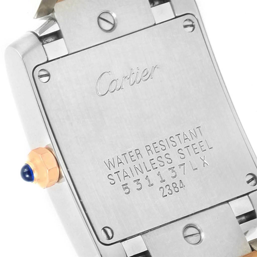 This image shows the back casing and crown of the Cartier Tank Française watch model, displaying its water resistance and material details.