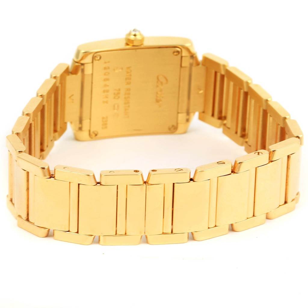 This image shows the back view of a Cartier Tank Francaise WE1001R8 Women's Yellow Gold Silver Dial WE1001R8 Women's Yellow Gold Silver Dial watch, highlighting its strap and case back.