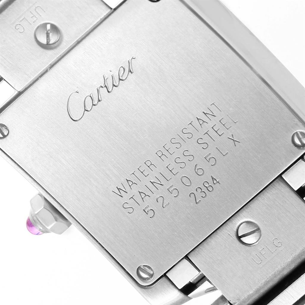 The image shows the back of a Cartier Tank Francaise W51031Q3 Women's Stainless Steel Silver Dial W51031Q3 Women's Stainless Steel Silver Dial watch, highlighting its stainless steel case and engraved details.