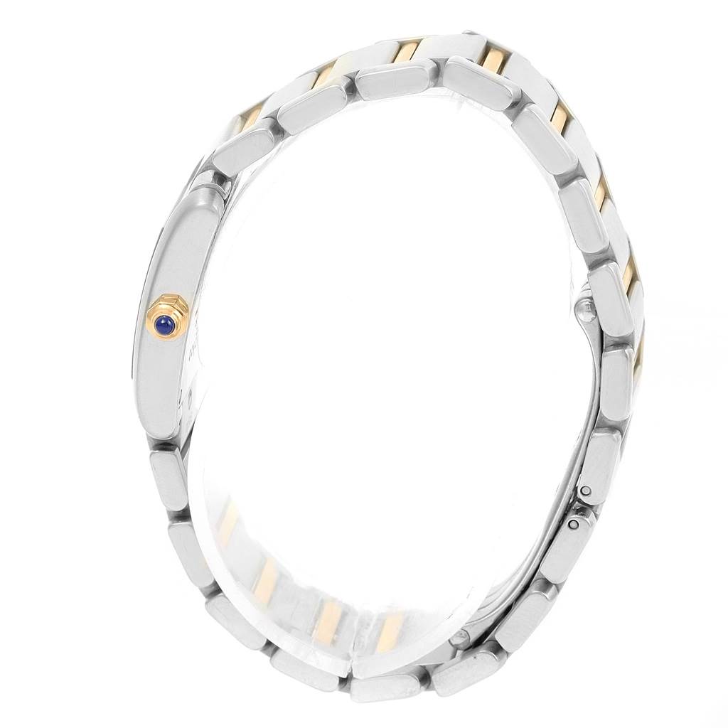 This image shows a side view of the bracelet and crown of a Cartier Tank Francaise W51007Q4 Women's Steel and Gold (two tone) Silver Dial W51007Q4 Women's Steel and Gold (two tone) Silver Dial watch.