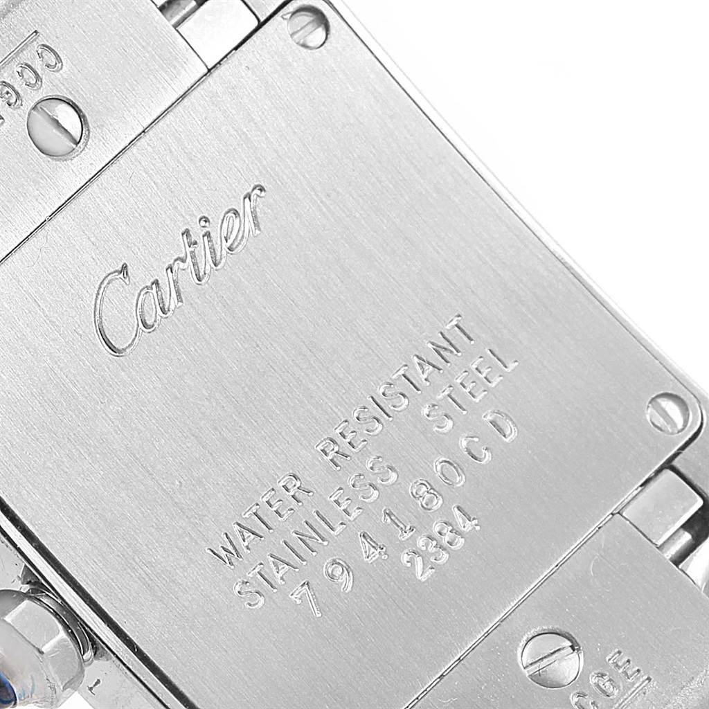 The image shows the back case of a Cartier Tank Francaise W51008Q3 Women's Stainless Steel Silver Dial W51008Q3 Women's Stainless Steel Silver Dial watch, displaying markings and details on water resistance and material.