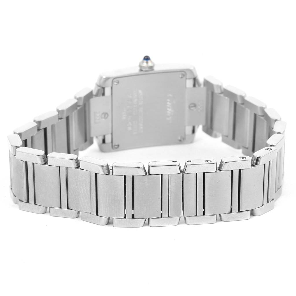 The image shows the back view of a Cartier Tank Francaise W51008Q3 Women's Stainless Steel Silver Dial W51008Q3 Women's Stainless Steel Silver Dial watch, highlighting its stainless steel bracelet and case back.