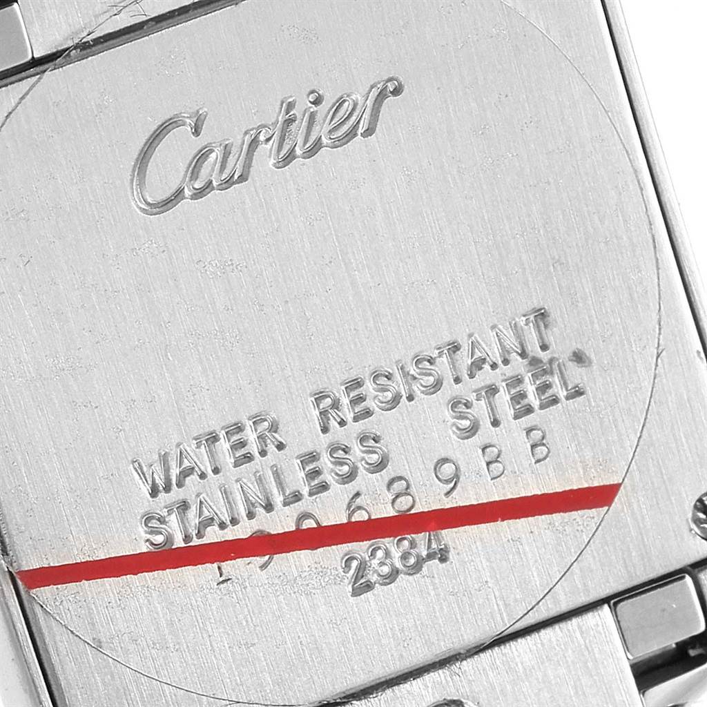 This image shows the back case of the Cartier Tank Française watch, highlighting its water resistance and stainless steel build.