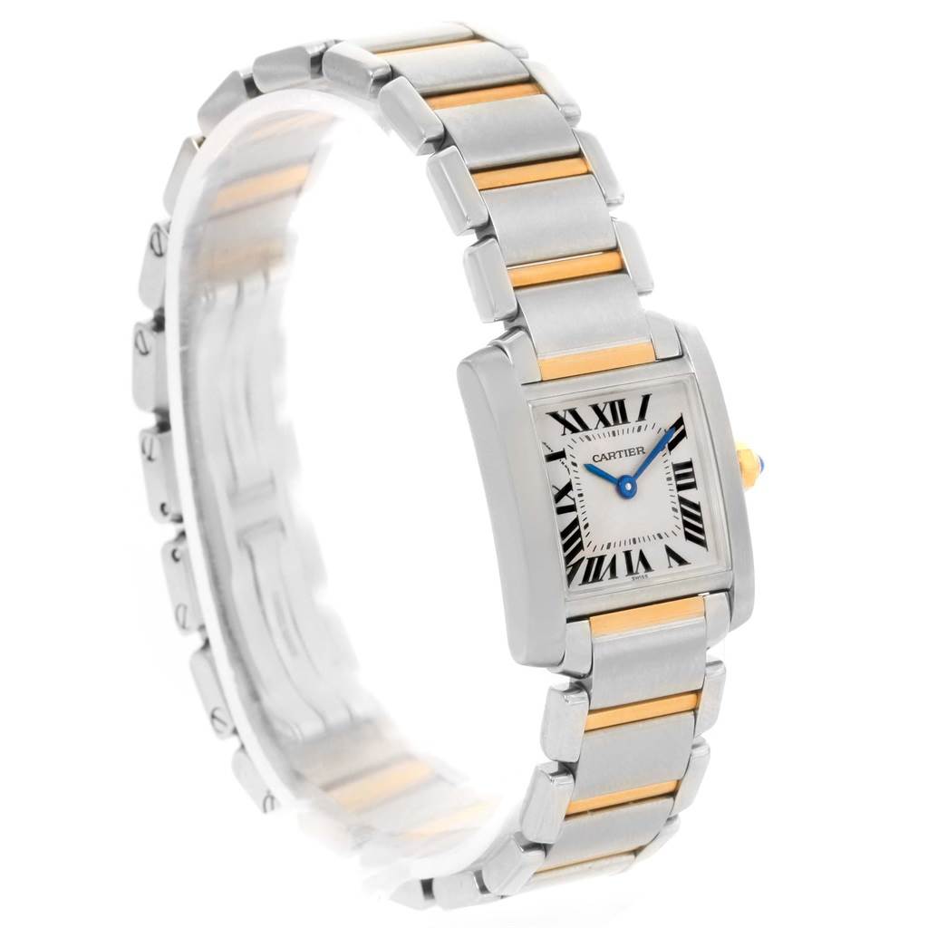 The image shows a Cartier Tank Française watch from an angled side view, highlighting the face and metal bracelet.