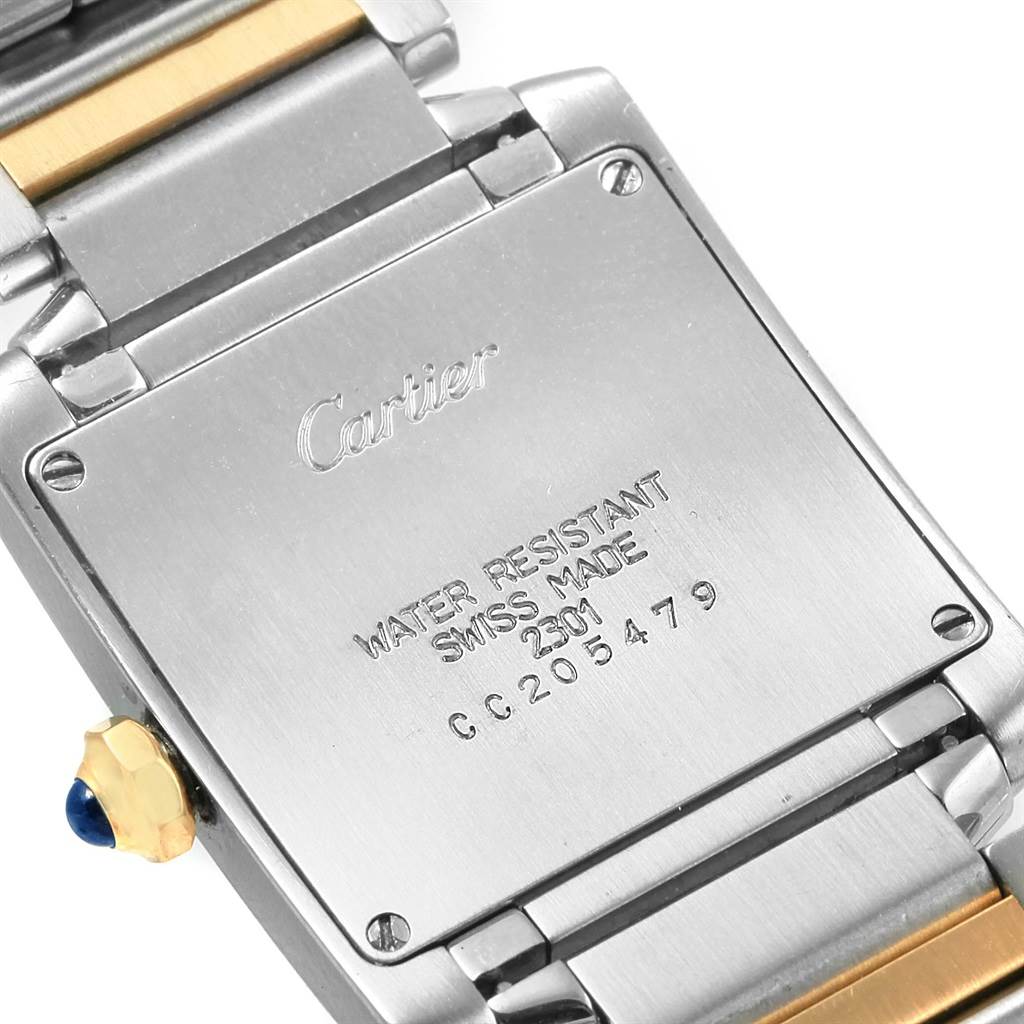 The image shows the back view of the Cartier Tank Francaise W2TA0003 Women's Steel and Gold (two tone) Silver Dial W2TA0003 Women's Steel and Gold (two tone) Silver Dial watch, highlighting the case back and part of the bracelet.