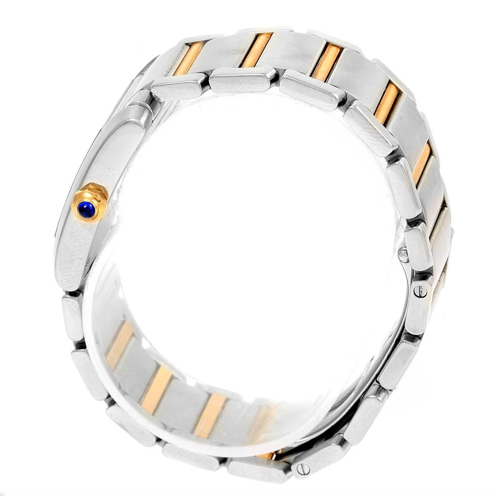 The image shows a side view of the Cartier Tank Francaise W2TA0003 Women's Steel and Gold (two tone) Silver Dial W2TA0003 Women's Steel and Gold (two tone) Silver Dial watch, highlighting its stainless steel and gold bracelet.